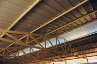 Roof- Twin Skillion<br/>Truss-4X2 Inch rectangle tubes<br/>Sheet- Gal aluminium Industrial Corrugation Sheet<br/>Gutter- Boxed Gal aluminium Plain sheet